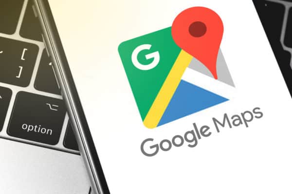 closeup Google Maps logo on screen of smartphone
